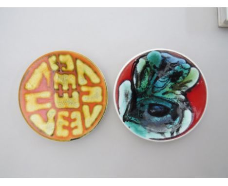 Two Poole Studio pin dishes, blue and black back stamps. 12.5cm diameters