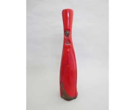 Rye - A David Sharp ceramic candle holder in the form of an ecclesiastical figure, marked to base, 38cm high 