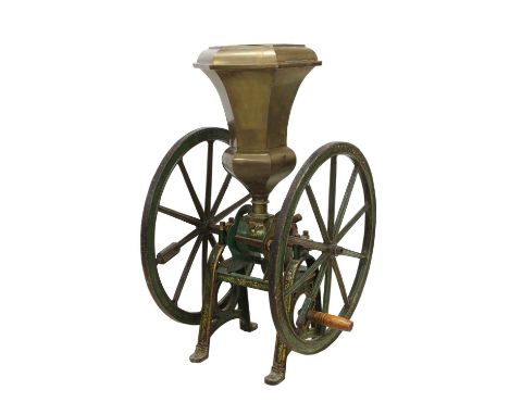 A large coffee grinder by Parnell &amp; Sons,19th century, on a green painted and gilt highlighted cast iron base surmounted 
