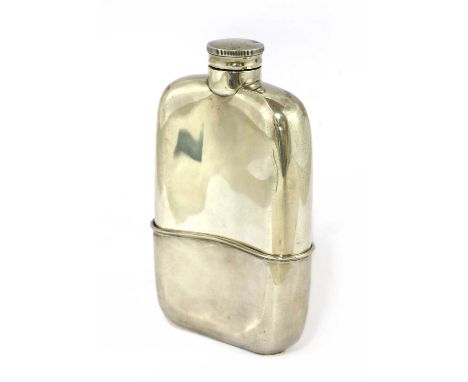 A George V silver spirit flask, by Walker &amp; Hall, Sheffield 1929,the shaped body with a detachable cup,15cm high, 7.4ozt