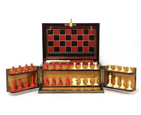 A Victorian coromandel cased games compendium,late 19th century, the lid and front opening to reveal a fitted interior with f