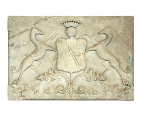 A carved marble coat of arms,19th century, probably French, the unidentified arms are probably those of a French nobleman who