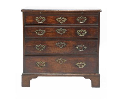 A mahogany bachelor's chest,18th century, the rectangular top with re-entrant corners, above a brushing slide and four gradua