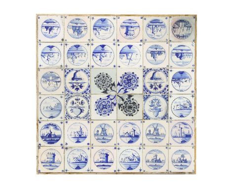 A panel of thirty-six delftware blue and white tiles,18th century, the four central depicting flowers, most of the remainder 