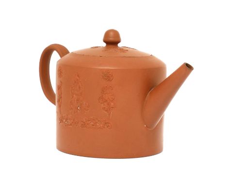 A Staffordshire redware cylindrical teapot and cover,c.1760, with an engine turned loop handle, conical spout and acorn knop,