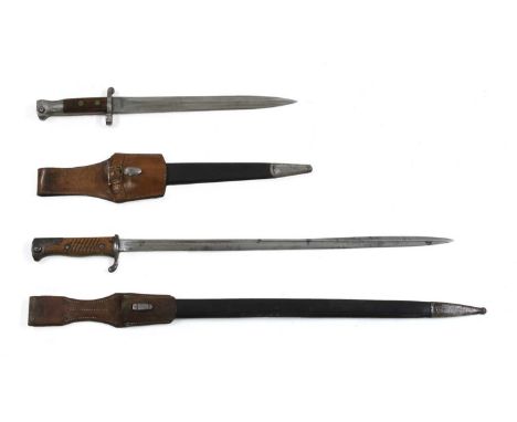 An 1888 pattern SMLE bayonet by Mole, with scabbard and regimental stamp, 42.5cm long, anda German WWI blade bayonet,the blad