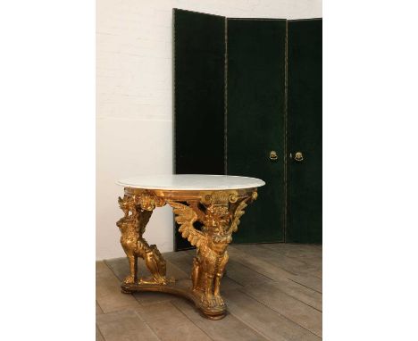 An Irish carved and giltwood centre table in the manner of Del Vecchio, Dublin,19th century, the moulded white marble top sup