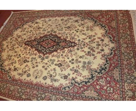 A large Persian carpet, having central floral medallion within floral border on brown ground, fringed, 336 x 240cm 