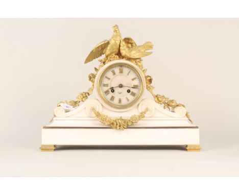 A mid 19th Century French marble mantle clock, gilt metal mounts surrounded by gilded doves, marble dial inscribed "Hry Mark,