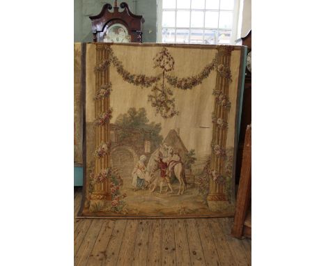 A 19th Century Aubusson tapestry depicting figures arriving at a ruined building, flanked by floral entwined classical column