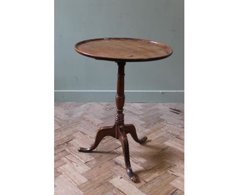 A late 18th Century tray top tripod flip top table