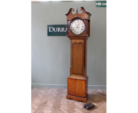 An early 19th Century oak and mahogany longcase clock with eight day striking movement and round steel dial inscribed "Foxton