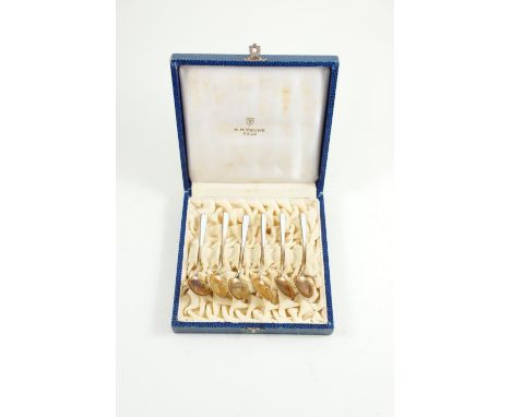 Cased set of Norwegian silver gilt & enamel coffee spoons, N.M. Thune Olsosome wear to enamel 