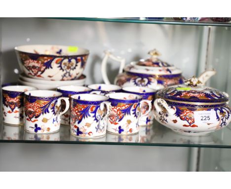 Royal Crown Derby Imari pattern tea service. 7 cups, 4 saucers, plate, lidded pot, sugar bowl, teapot.Chip to one saucer, chi