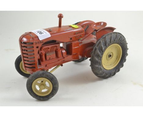 An unboxed vintage Lesney diecast large scale model of a Massey Harris 745D Tractor in red with lemon hubs and rubber tyres 