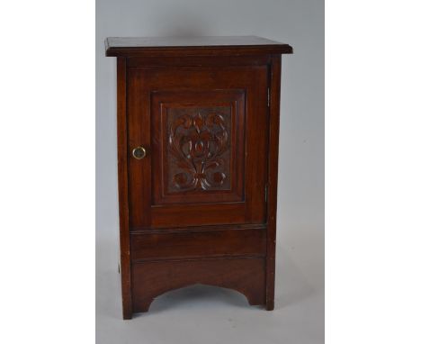 Mahogany pot cupboard with carved panel h62cm  W40cm 