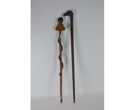 Carved hardwood walking stick with mythical beast head handle 94.5cm long and shaman style carved snake walking stick 88cm lo