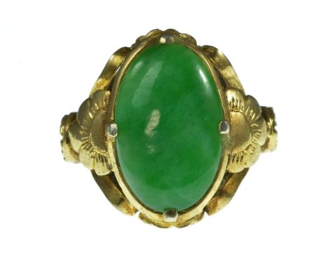 Yellow metal &amp; jade ring, tests positive for 9ct gold, size O1/2, 5.4 grams stone is 17mm x 10mm approx