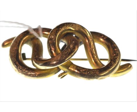 Yellow metal brooch, tests positive for 9ct gold, 49mm wide, later non gold pin, gross weight 5.28 gramssmall crack to brooch