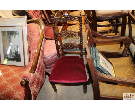 A faux walnut ladder back chair 