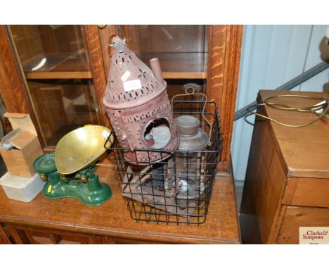Three vintage metal lanterns; a wirework basket; and a metal animal figure 