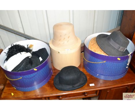 A collection of various vintage hats, Liberty hat boxes etc.