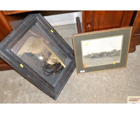 A vintage photograph of a harvesting scene; and a wooden framed wall mirror 