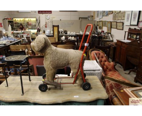 A vintage push-a-long dog  AF