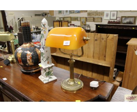 A desk lamp with opaque shade 