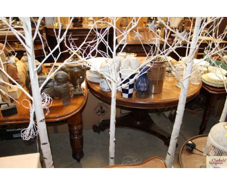 A wooden tree lamp