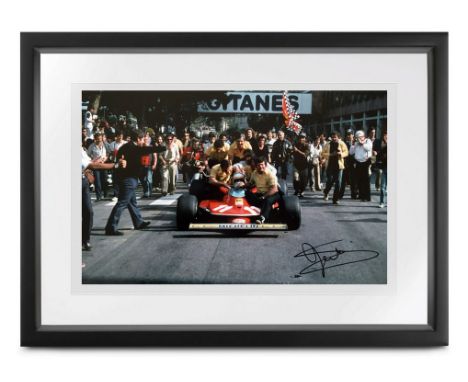 Commissioned by Jody Scheckter, atmospheric period photograph of Jody celebrating his win at Monaco in 1979, hand signed by J