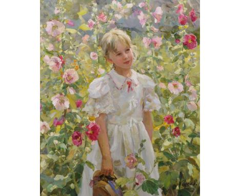 Vladimir Goussev (1957    ) Russian. Portrait of a Young Girl Standing in a Flower Garden, dressed in white and holding a hat