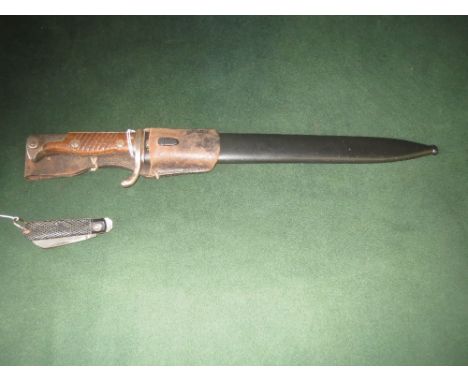 German military bayonet by WAFFEN FABRIK  Mauser A.G OBERNDORF stamp on the blade in its original metal scabbard and military