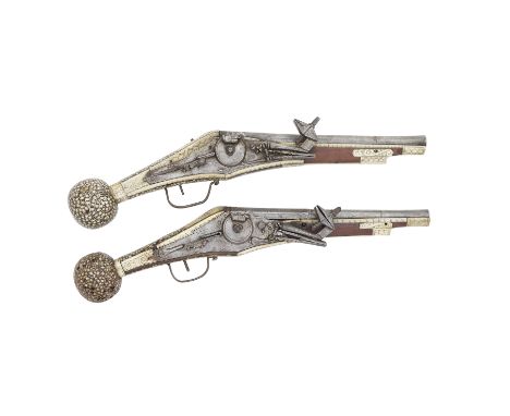 A Brace Of German Wheel-Lock Holster Pistols (Puffer)Late 16th CenturyWith swamped two-stage barrels each with incised lines 