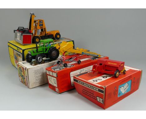 A Corgi model 'Hyster Challenger 800' lift truck (boxed) together with four Britain's models, Hay Baler 9556, Tractor 9526, E