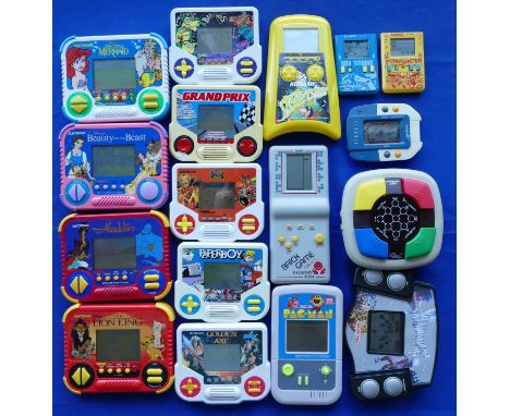 A collection of hand held electronic games from the 1980s/90s titles to include, Paperboy, Aladdin, Golden Axe, The Little Me