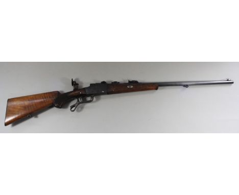 A German falling breach action 'Schutzen' target rifle, by Max Koch Luca, Munich, the barrel with proof stamps, not readable,