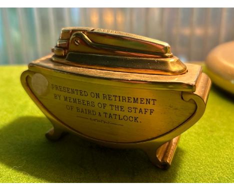 A Ronson table lighter, presented on retirement by members of the staff of Baird &amp; Tatlock, 10cm (w)  / All lots are loca