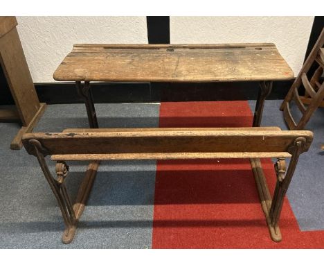 A Victorian oak children's two seater school desk with folding lid on cast iron base, 58cm (h) x 98cm (w) x 60cm (d)   / All 