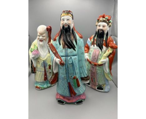 Three porcelain figurines of Chinese Famille Rose Sanxing Gods, Fu Lu Shou, tallest 28cm (h)  / All lots are located at Gower