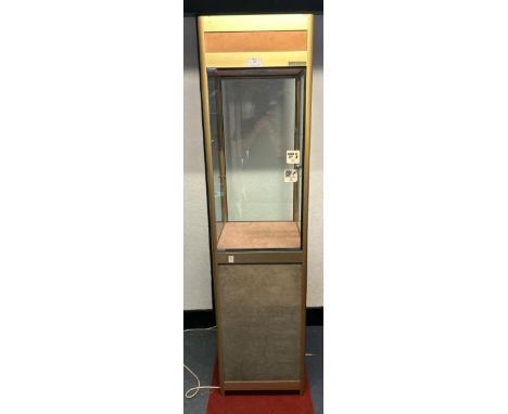 A tall glass display cabinet, with key, without internal glass shelf, 200cm (h) x 50cm (w) x 50cm (d)  / All lots are located