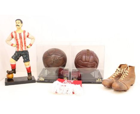 Football: A collection of assorted football memorabilia to include: a pair of vintage football boots, Size 10, two footballs 