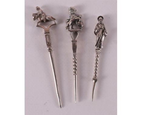 Three second grade 835/1000 silver pipe sticks, 19th century. O.a. with crowning of apostle and rider on horseback, maker's m