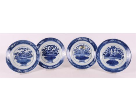 Four blue/white porcelain saucers, China, Kangxi, early 18th century. Blue underglaze decor of a basket with flowers on the s