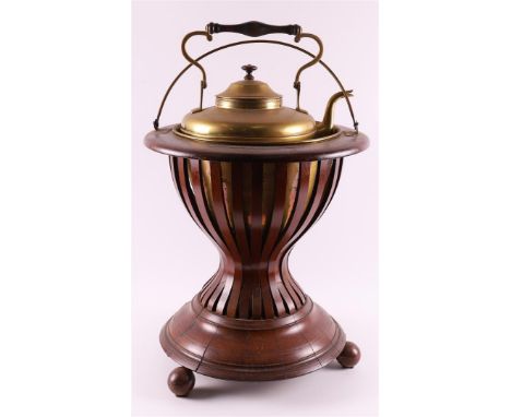 A mahogany so-called hourglass model slatted stove, 2nd half 19th century. Baluster-shaped trunk, resting on convex legs, bra