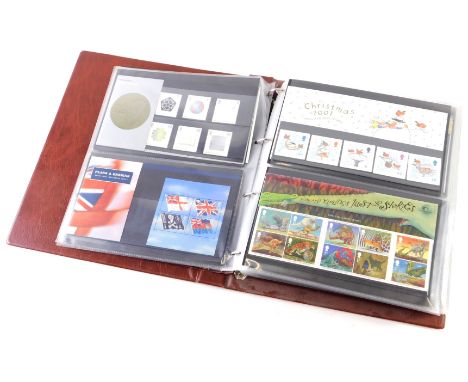 Various first day covers, Christmas 2001, etc., in a Royal Mail presentation pack. 