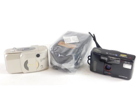 An as new Nikon compact zoom 70W light touch camera, in outer packaging. (unused) 