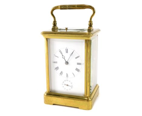 An early 20thC brass minute repeating carriage clock, with Roman numeric dial subsidiary Arabic second hand revealing a barre