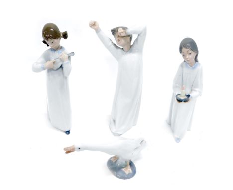 Various Lladro figures, girl playing mandolin 23cm high, boy yawning, girl holding candle and goose, printed marks beneath (4
