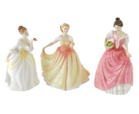 Three Royal Doulton figures, to include Figure of the Year 1995 Deborah, HN3644, printed marks beneath, 22cm high, etc. (3) 
